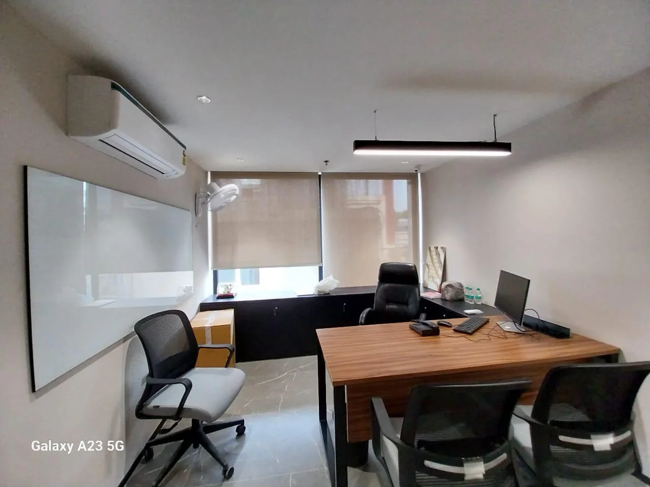 Executive cabin designed by the Best Office Interior Designer in Noida with custom furniture and modern workspace planning.