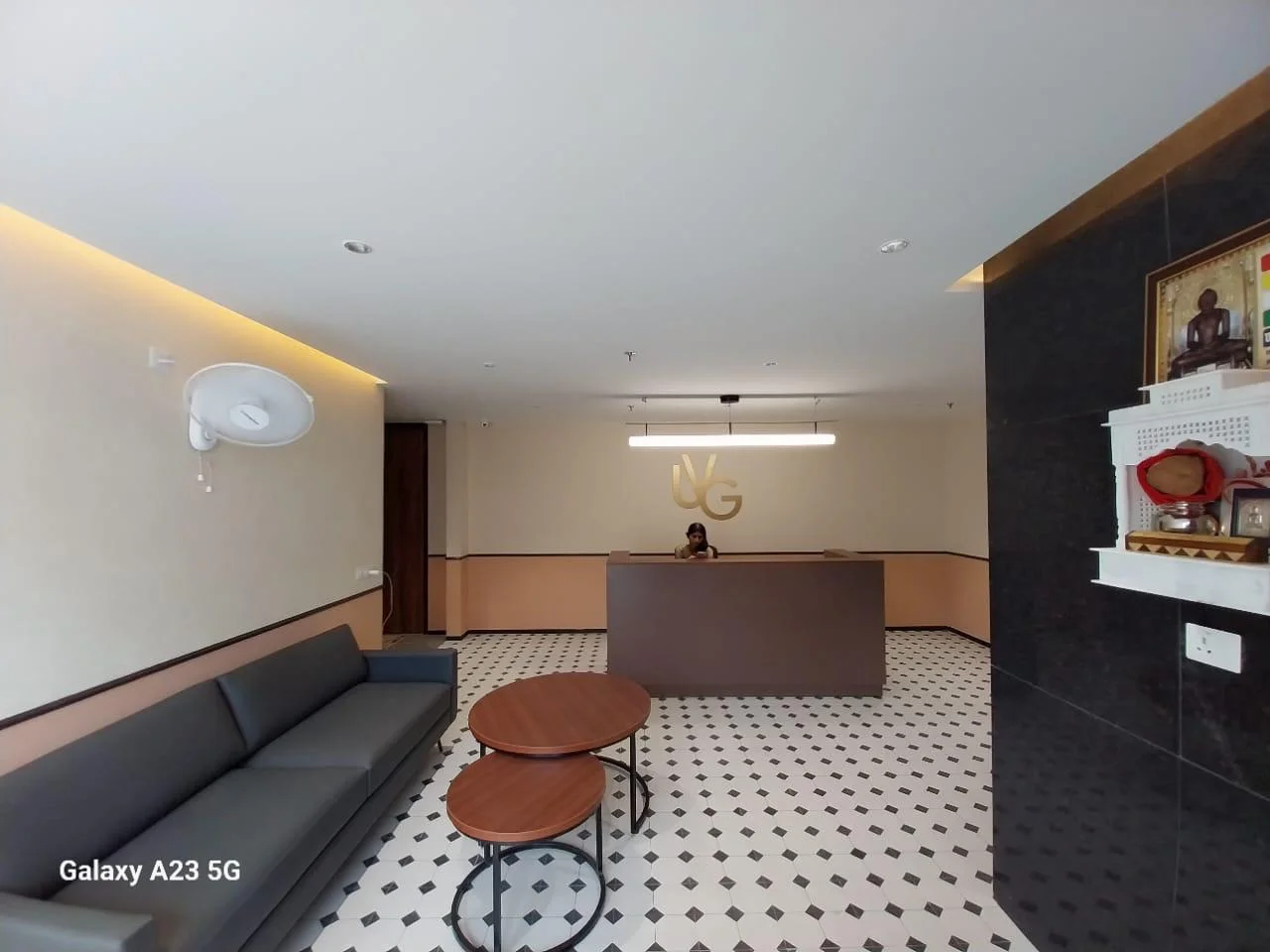 Professional office reception and visitor area completed by ARC Pacific Interiors in Noida.